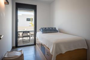 Posteľ alebo postele v izbe v ubytovaní AT307 Planta baja con piscina a pocos metros de la playa Cañadel