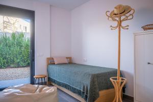 Posteľ alebo postele v izbe v ubytovaní AT307 Planta baja con piscina a pocos metros de la playa Cañadel + 27 fotografií