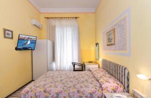 Postel nebo postele na pokoji v ubytování Hotel Stella Del Mare