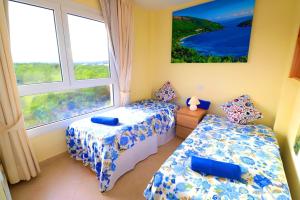 Postel nebo postele na pokoji v ubytování Top Strandwohnung Marina Park
