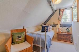 Postel nebo postele na pokoji v ubytování Rose Cottage