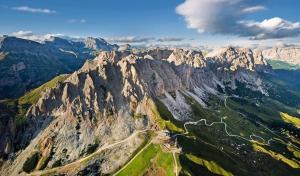an aerial view of a mountain with a road at Rifugio Frara in Selva di Val Gardena