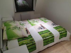 Katil atau katil-katil dalam bilik di Le Green Duplex moderne en hypercentre
