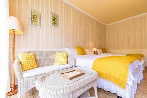 Postel nebo postele na pokoji v ubytování Flower Happiness Homestay
