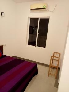 Postel nebo postele na pokoji v ubytování Nilwala Gate wetland Stay