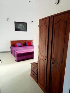 Postel nebo postele na pokoji v ubytování Nilwala Gate wetland Stay