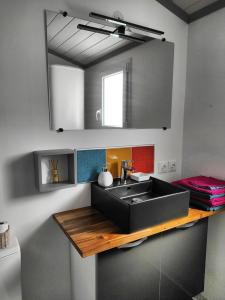 Kuchyňa alebo kuchynka v ubytovaní La Casita: Studio cosy indépendant de 25 m²
