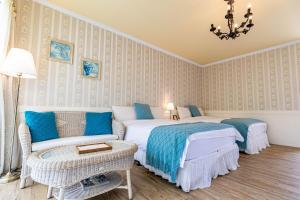 Postel nebo postele na pokoji v ubytování Flower Happiness Homestay