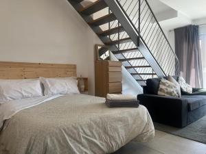 Posteľ alebo postele v izbe v ubytovaní Love Rent4 Málaga loft