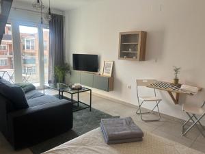 TV a/nebo společenská místnost v ubytování Love Rent4 Málaga loft