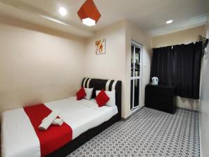 Ένα ή περισσότερα κρεβάτια σε δωμάτιο στο Ar Rayyan Hotel