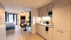 Kuchyň nebo kuchyňský kout v ubytování Nena Apartments SPREEblau