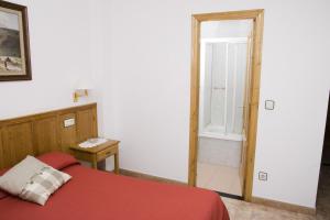 Postel nebo postele na pokoji v ubytování Hotel Restaurante Prado