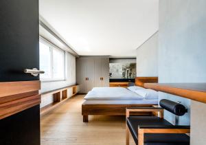 Hôtel des Bains de Saillon客房内的一张或多张床位