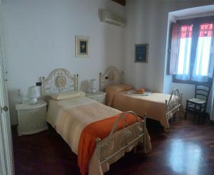 Postel nebo postele na pokoji v ubytování B&B Federica