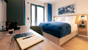 Postel nebo postele na pokoji v ubytování Nena Apartments SPREEblau