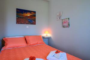 Postel nebo postele na pokoji v ubytování Pavlina's Apartments 1