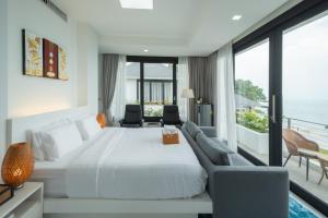 Bluemango Pool Villa & Resort Koh Samui客房内的一张或多张床位