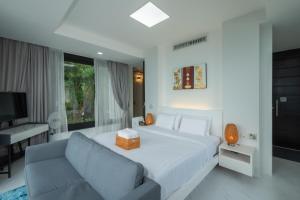 Bluemango Pool Villa & Resort Koh Samui客房内的一张或多张床位