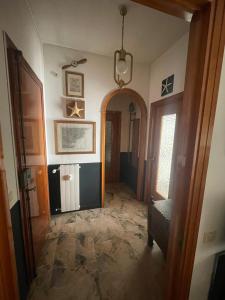 a hallway of a home with a door and a room at ALLOGGIO VISTA MARE LOANO in Loano