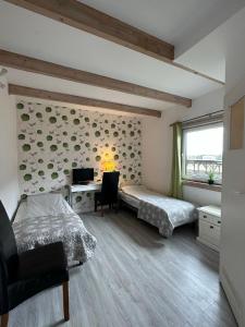 Ένα ή περισσότερα κρεβάτια σε δωμάτιο στο Samsara - Prawdziwa Agroturystyka