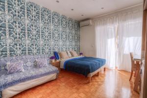 מיטה או מיטות בחדר ב-La Casa Sul Mare