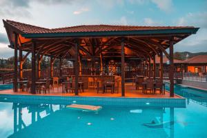 a pavilion on the edge of a swimming pool at Enso Inn in Fethiye