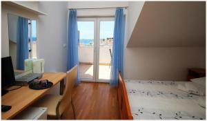 Postel nebo postele na pokoji v ubytování Guest House Lav