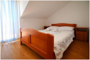 Postel nebo postele na pokoji v ubytování Guest House Lav