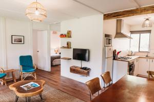 Televiisor ja/või meelelahutuskeskus majutusasutuses Margaret River Holiday Cottages