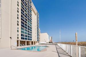 a swimming pool in the middle of a building at Edgewater West 63 in Gulf Shores