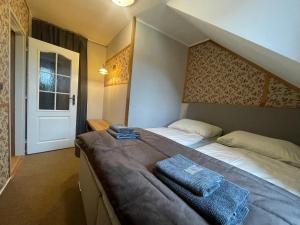 Postel nebo postele na pokoji v ubytování Hotel Veveří