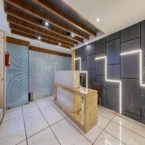 an office with a desk in a room at Hotel Riva International Goregaon- Near NESCO in Mumbai