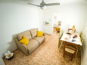 a living room with a couch and a table at La Tienda de Miguel in El Chorro
