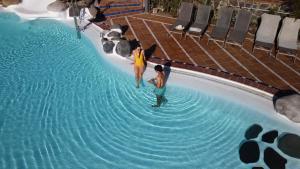 Bazén v ubytovaní Corallium Beach by Lopesan Hotels - Adults Only alebo v jeho blízkosti