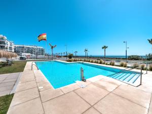 The swimming pool at or close to New beach front apartment with large balcony
