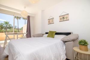 Posteľ alebo postele v izbe v ubytovaní Vistamarina A108 by IVI Real Estate