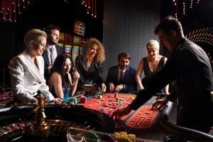 a group of people playing roulette in a casino at Onyx City Center in Tbilisi City +112 photos