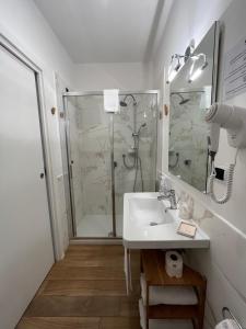 Ванна кімната в Residenza Madonna