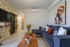 TV a/nebo společenská místnost v ubytování Stone Project Villa