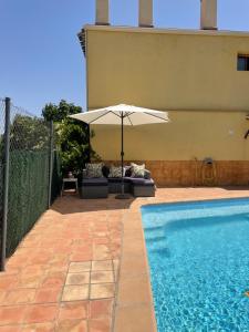 The swimming pool at or close to Air Conditioned "Casa Tropicana" Entire Villa or Individual Apartments