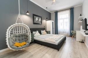 Posteľ alebo postele v izbe v ubytovaní Trendy Design Apartment