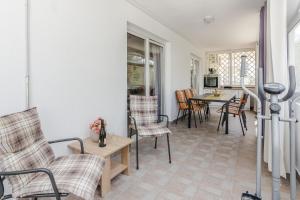 Posedenie v ubytovaní Apartments Jagunic