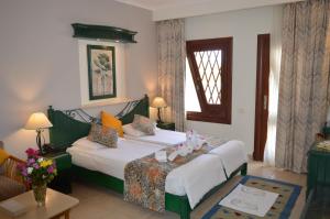Postel nebo postele na pokoji v ubytování Swiss Inn Resort Dahab