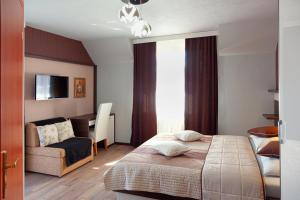 Posteľ alebo postele v izbe v ubytovaní Guesthouse Villa Plitvička + 37 fotografií