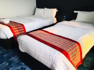 Postel nebo postele na pokoji v ubytování Hotell Hill Crown