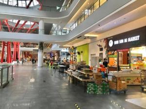 a large shopping mall with a food court in it at G2 1-8Paxs Cozy Home Sunway Medical Geo SmrtTV 3bed in Kampong Penaga