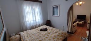 Posteľ alebo postele v izbe v ubytovaní AUTHENTIC HOUSE STRATONI CHALKIDIKI GREECE 6P SEAVIEW