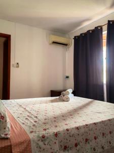 En eller flere senge i et værelse på 2 bedrooms apartement with furnished terrace and wifi at Trou aux Biches 1 km away from the beach