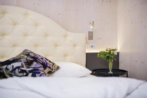 Postel nebo postele na pokoji v ubytování myLoisl Apartments